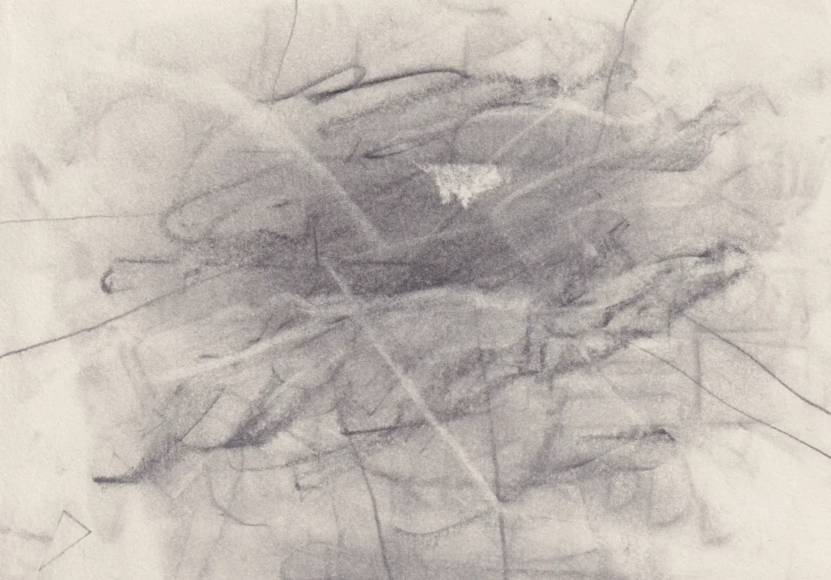 Tangle of smudged graphite lines on cream paper with a small patch of scraped white near the centre