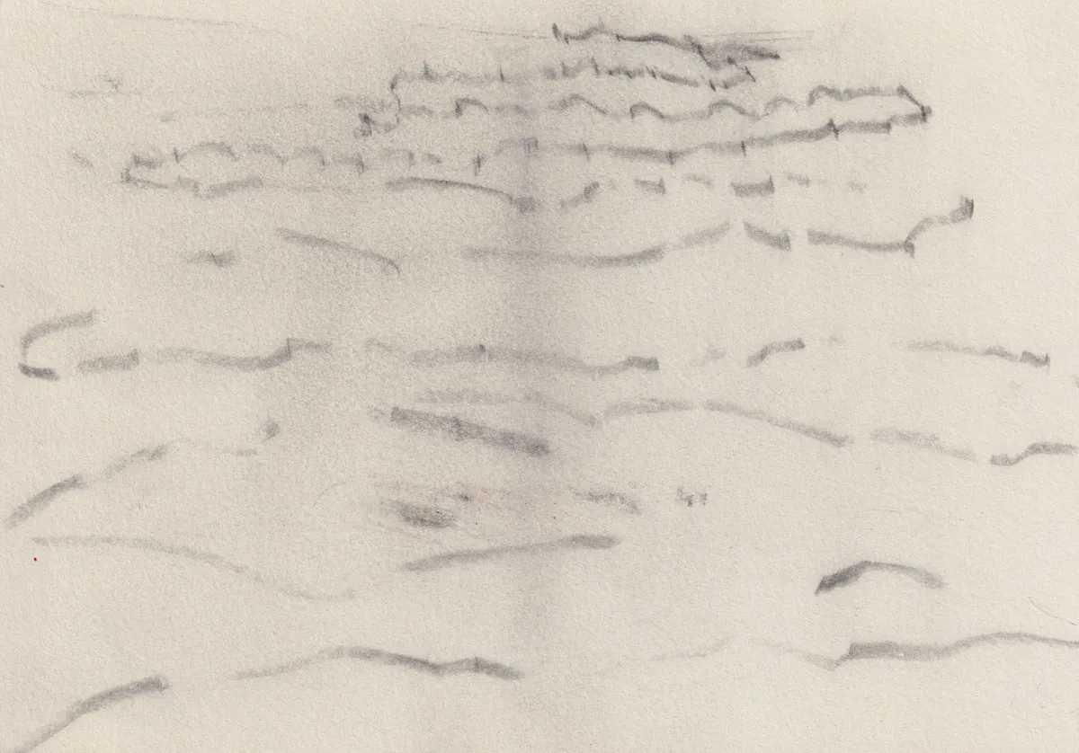 Cream paper with wavering horizontal rows of small broken marks