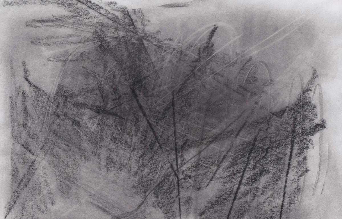 Heavy dark graphite hatching on white paper, crossed by thin straight lines, with a lighter haze at upper right
